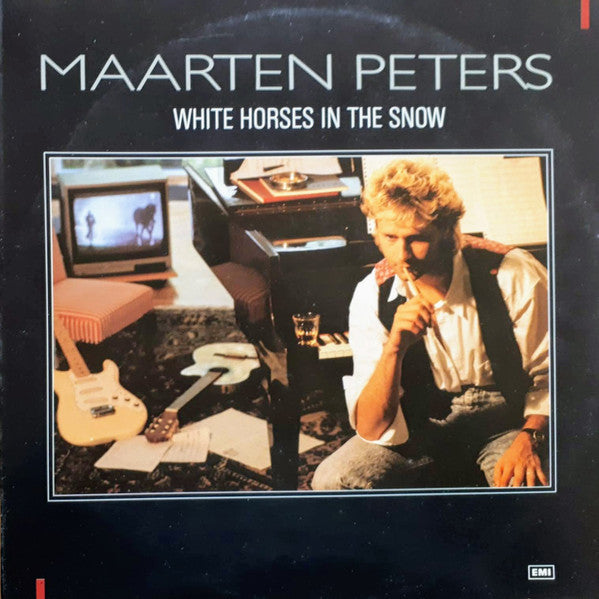 white horses in the snow